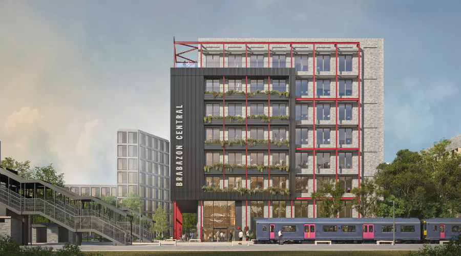 Rendering of a train pulling into the new station at Brabazon in front of the station building.