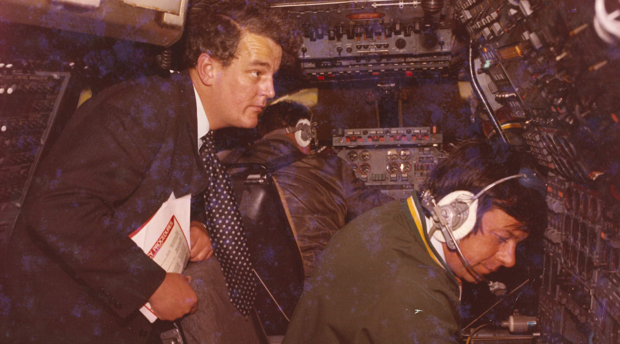 Brian Watts Senior Engineer in the cockpit of Concorde with the pilot on its maiden flight.
