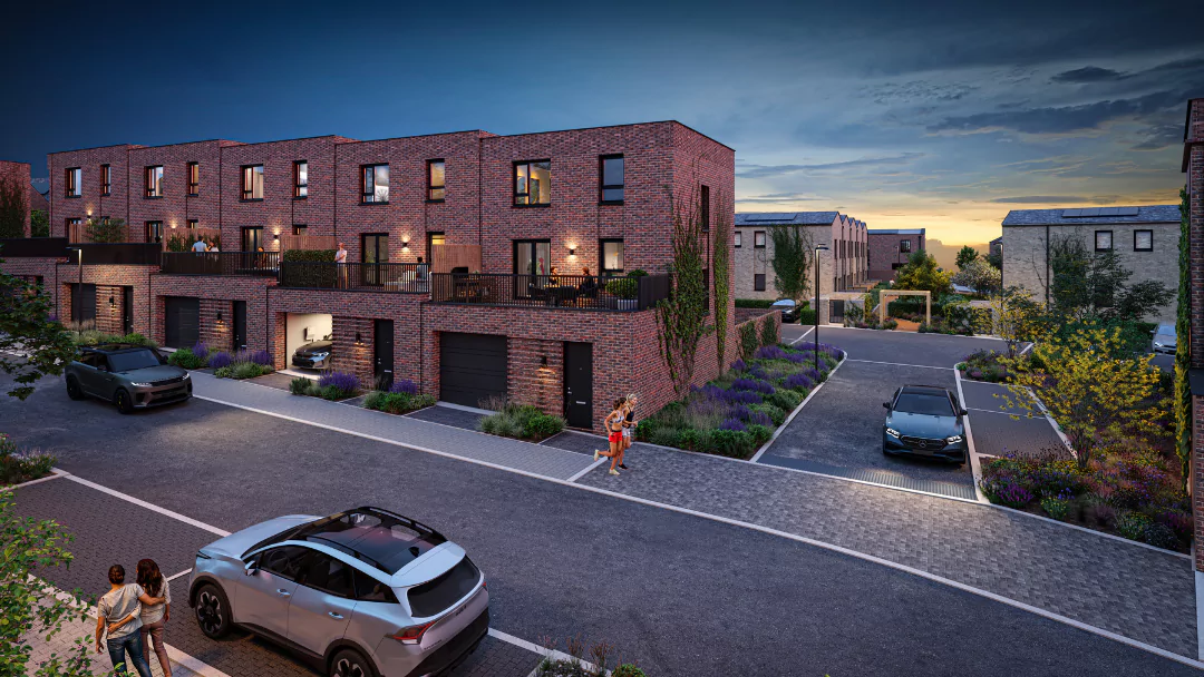 A row of three-bedroom townhouses with a first storey garden terrace at The Heritage District, Brabazon.
